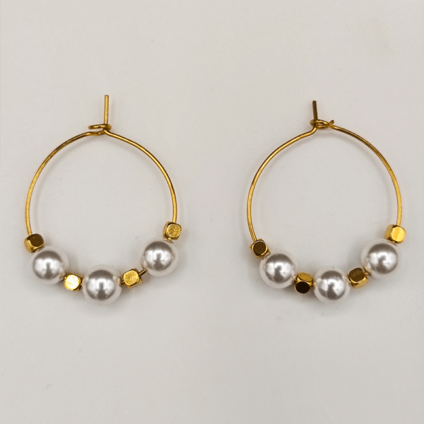 Boucles d’oreilles Éclat d’ivoire - L’éclat pur d’un rivage sacré.