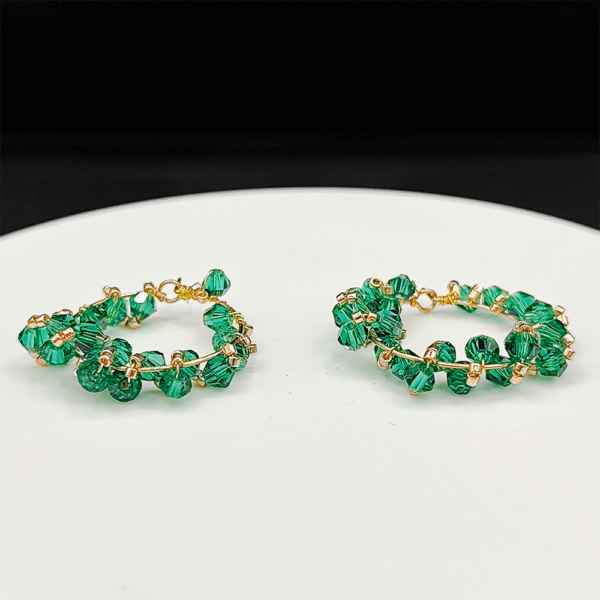 Boucles d'oreilles Emeraudae  – Quand la lumière rencontre l’élégance dorée.
