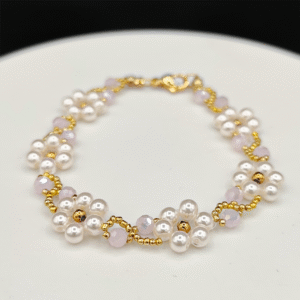 Bracelet Marguerites Rosé – Délicatesse florale et éclats dorés