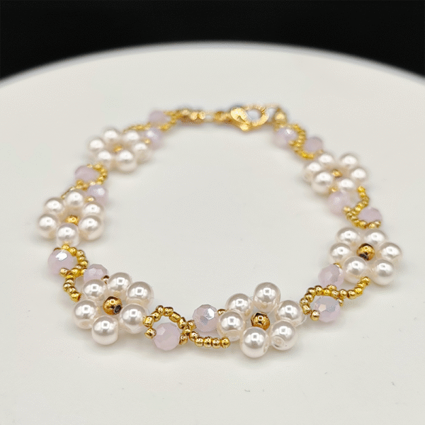 Bracelet Marguerites Rosé – Délicatesse florale et éclats dorés