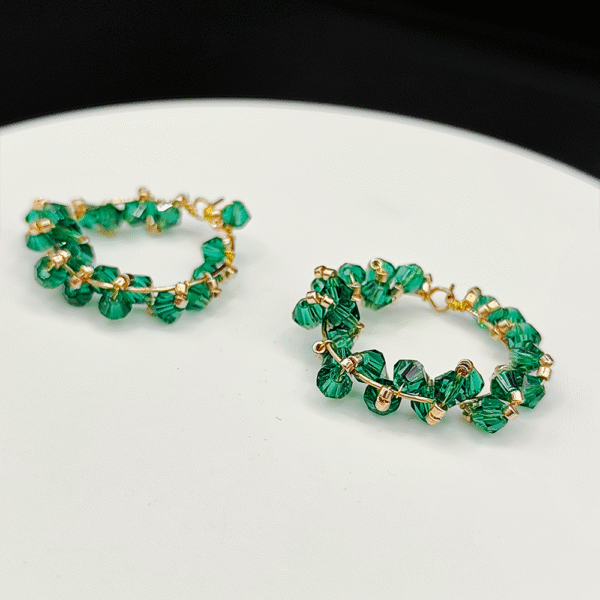 Boucles d'oreilles Emeraudae  – Quand la lumière rencontre l’élégance dorée.