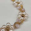 Bracelet Marguerites Rosé – Délicatesse florale et éclats dorés