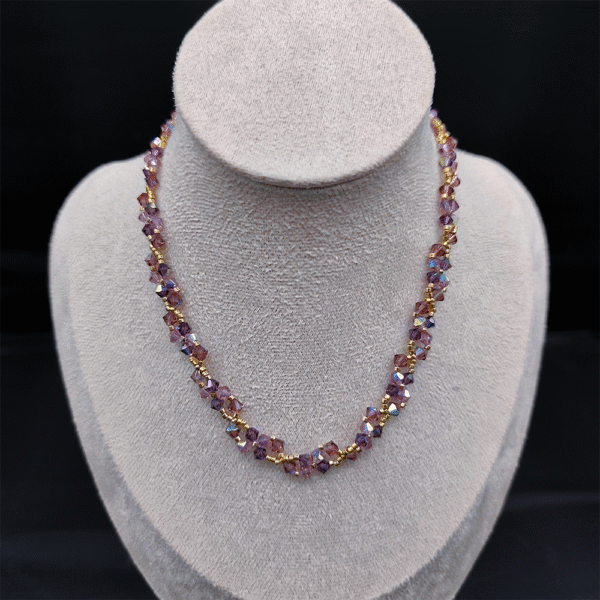 Collier Héliotrope – Éclats étoilés aux reflets d’améthyste